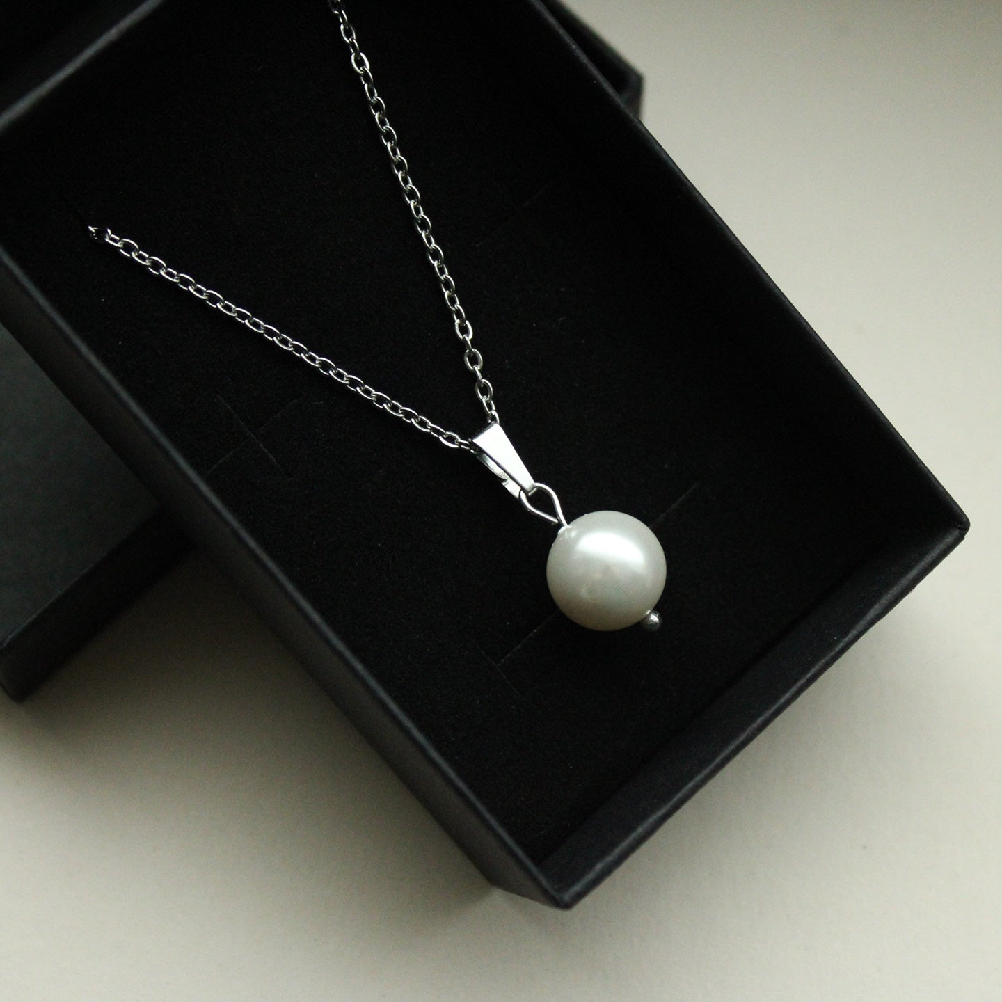 Halskette in Silber mit Perle als Anhänger, Edelstahl