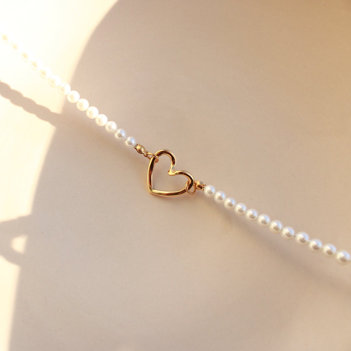 Perlenkette mit Herzanhänger/ Zwischenelement in Gold, Edelstahl