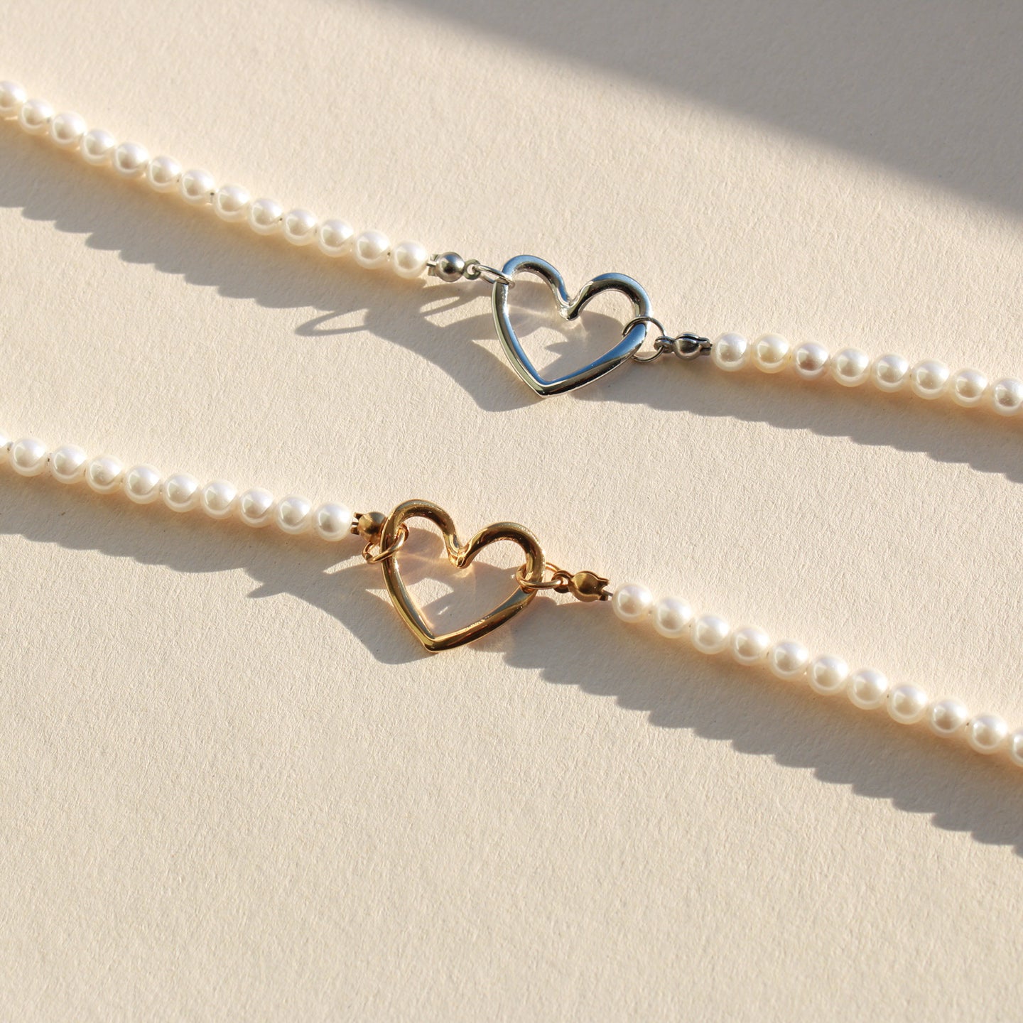 Perlenkette mit Herzanhänger/ Zwischenelement in Gold, Edelstahl