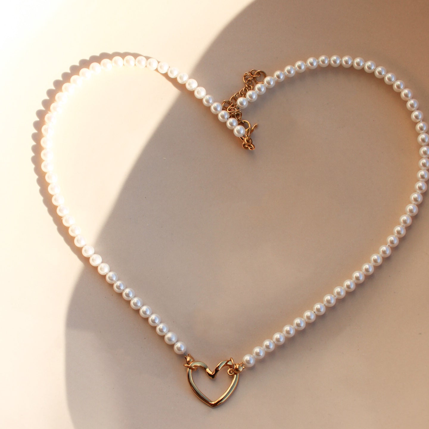 Perlenkette mit Herzanhänger/ Zwischenelement in Gold, Edelstahl