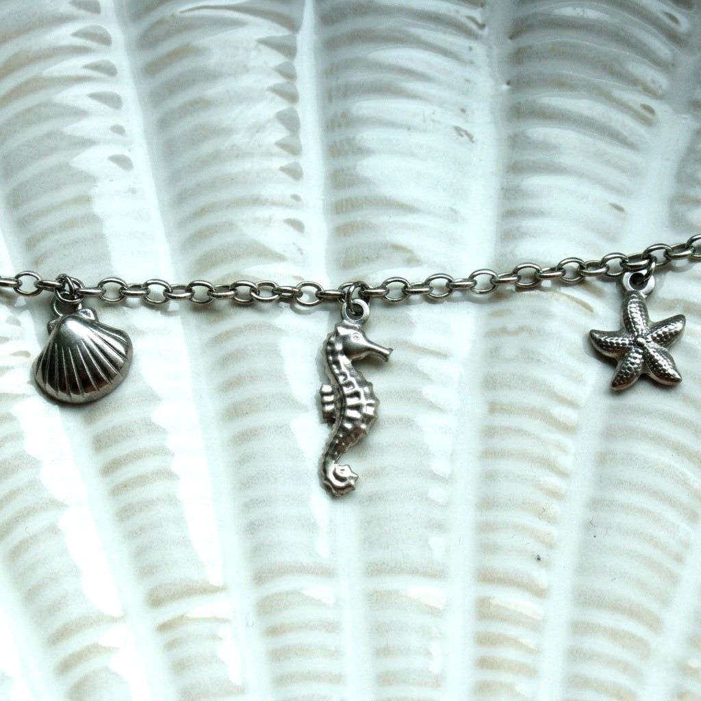 Halskette mit Seepferdchen, Seestern und Muschel-Anhänger in Silber aus Edelstahl