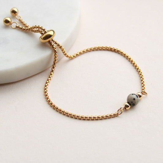 Armband in Gold mit kleiner Natursteinperle Dalmatiner Jaspis,Edelstahl