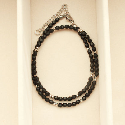 Schwarze Perlenkette mit Edelstahlperlen in Silber