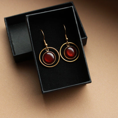 Edelstahl-Ohrringe in Gold mit braunem Stein