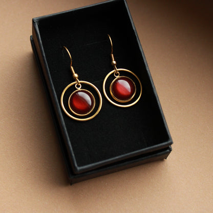 Edelstahl-Ohrringe in Gold mit braunem Stein