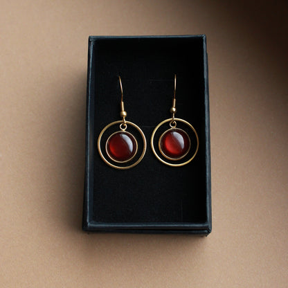 Edelstahl-Ohrringe in Gold mit braunem Stein