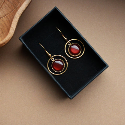 Edelstahl-Ohrringe in Gold mit braunem Stein