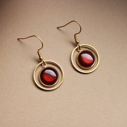 Edelstahl-Ohrringe in Gold mit braunem Stein