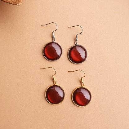 Ohrringe in Silber mit rundem braunen Stein aus Edelstahl (2 cm)