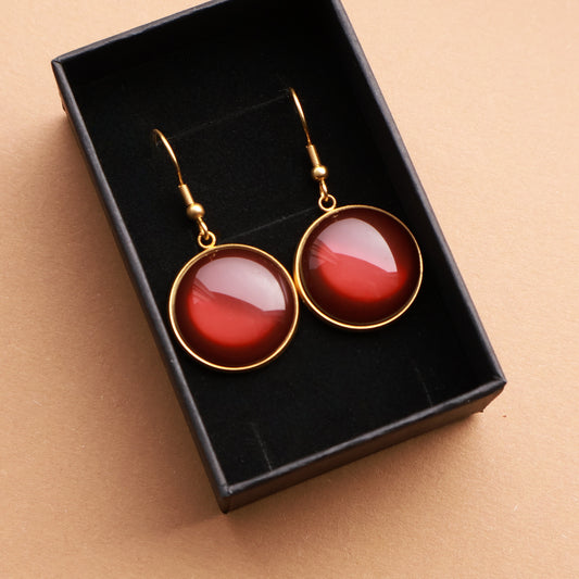 Ohrringe in Gold mit rundem braunen Stein aus Edelstahl (2 cm)