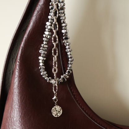 Taschenanhänger aus Edelstahl und Hämatitperlen in Silber mit mit 2 wechselbaren Anhängern