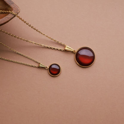 Goldene Halskette mit rundem Anhänger in Braun (2 cm), Edelstahl