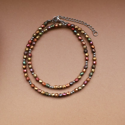 Perlenkette in warmen Erdtönen und Silber, Perlen mit Metallic-Matt Effekt